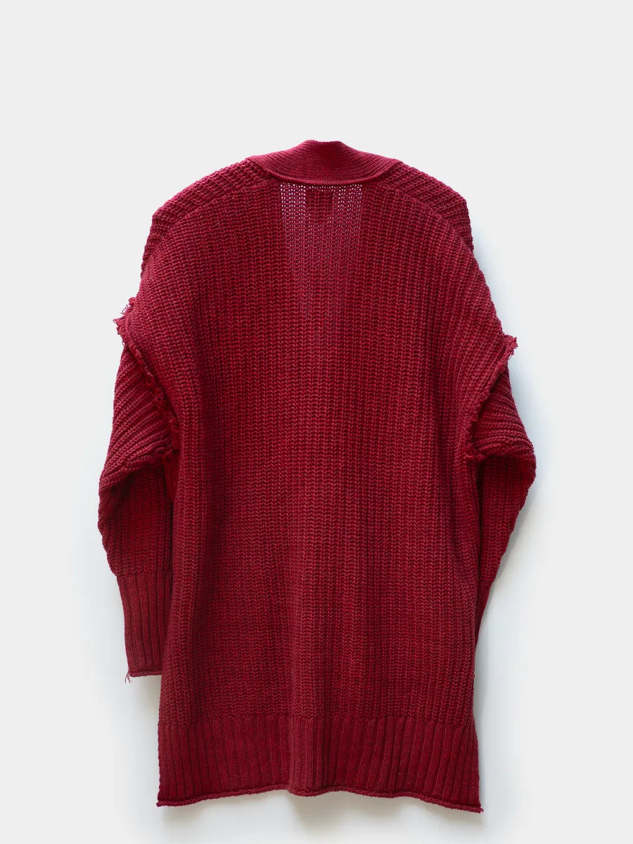 back view of deep red bdg cardigan with raw outseams and chunky rolled hem and cuffs.