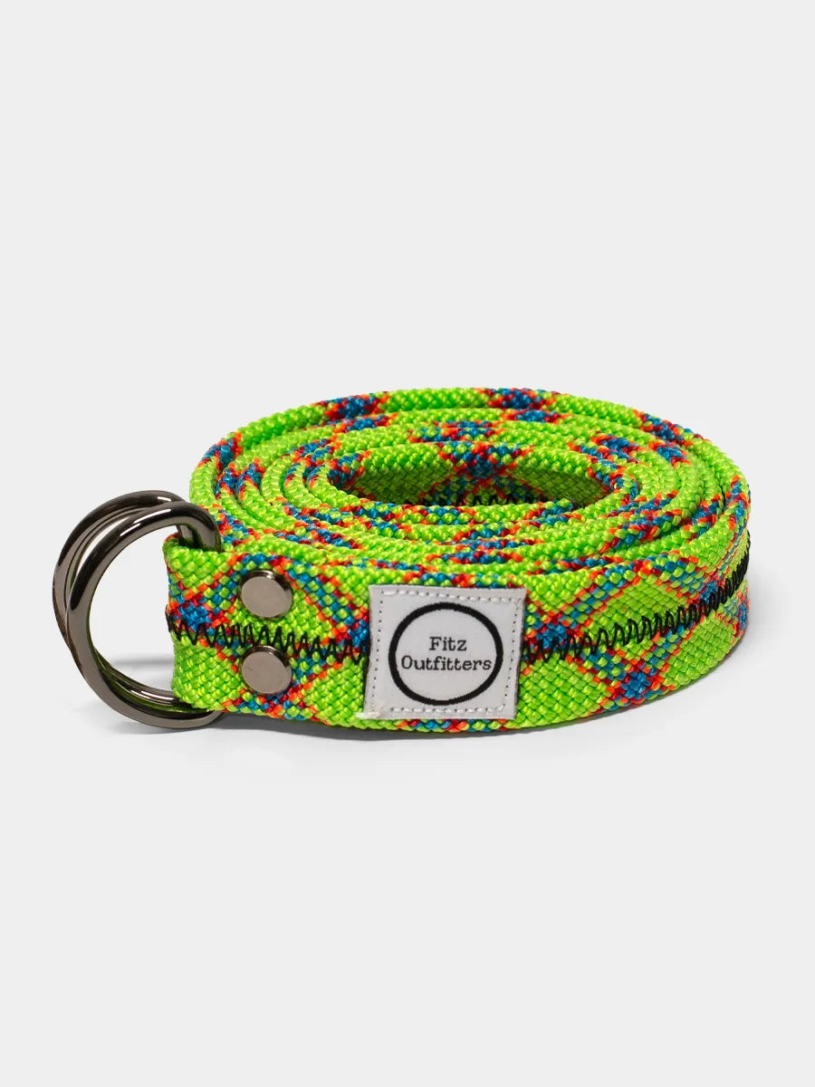 A multicolored, upcycled climbing rope belt with a metal D-ring, displayed against a white background.