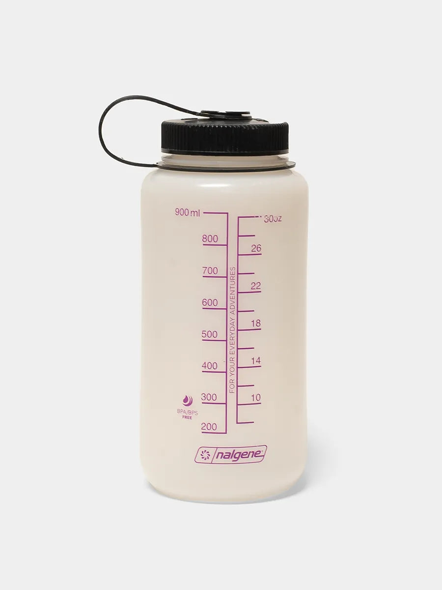 Multicolored water bottle with black cap on a white background