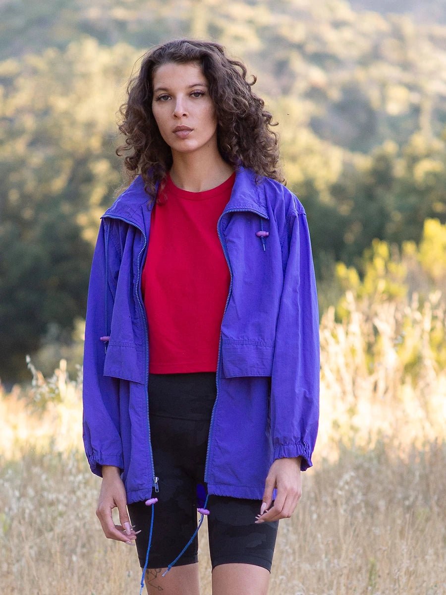 Model wears Vintage Eddie Bauer Parka Violet Blue and Red Articles In Common tank
