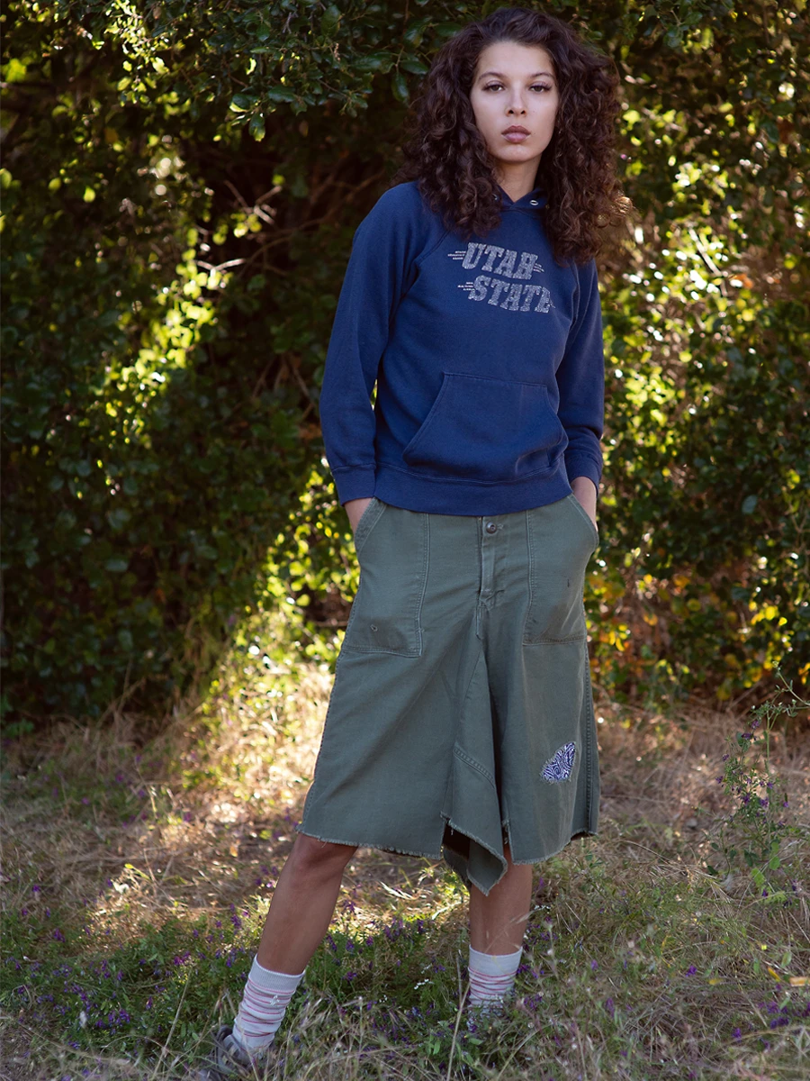 model wears a vintage utah state hoodie with ICONS bandana skirt 