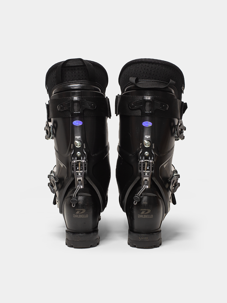 BACK VIEW Pair of DALBELLO PANTERRA SKI BOOTS BLACK with visible brand logo on a white background