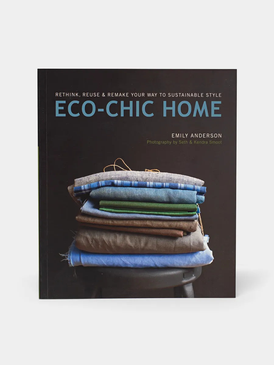 Book cover of 'Eco-Chic Home' featuring a stack of pillows with various fabrics.