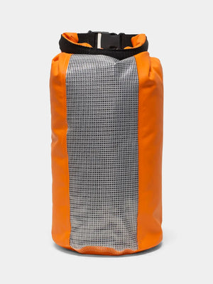 grid constrast panel on orange dry bag with black handle on white background