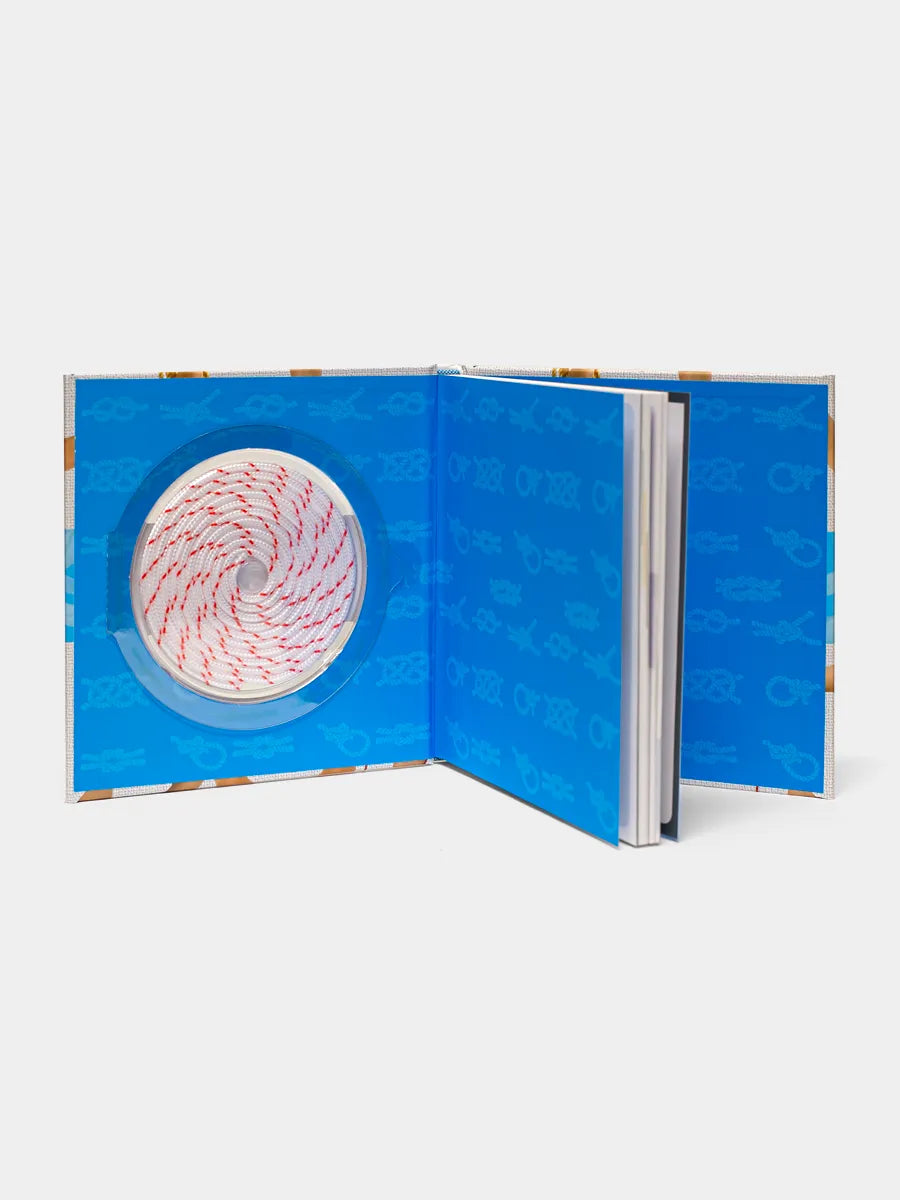 inside cover of book with practice rope inside book of Essential Knots