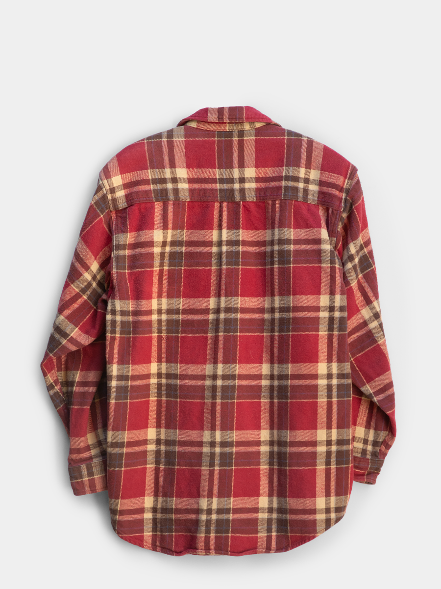 Back view of Red/brown/tan flannel heavy cotton shirt by Field & Stream hanging on a wooden hanger against a white background