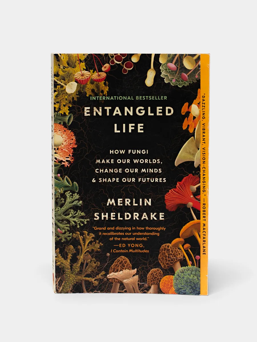 Front Cover of Entangled Life Book with illustrations of colorful mushrooms framing the title.