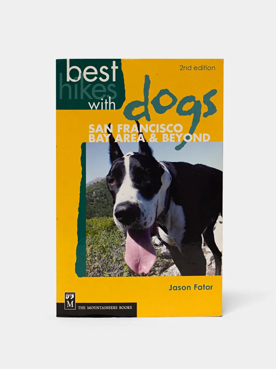 Best Hikes with Dogs San Francisco Paperback Cover Yellow and Green with a photo of a black and white dog on the cover.