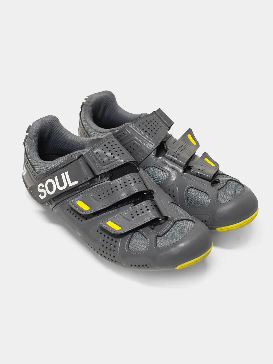 Top view of gray and yellow cycling shoes