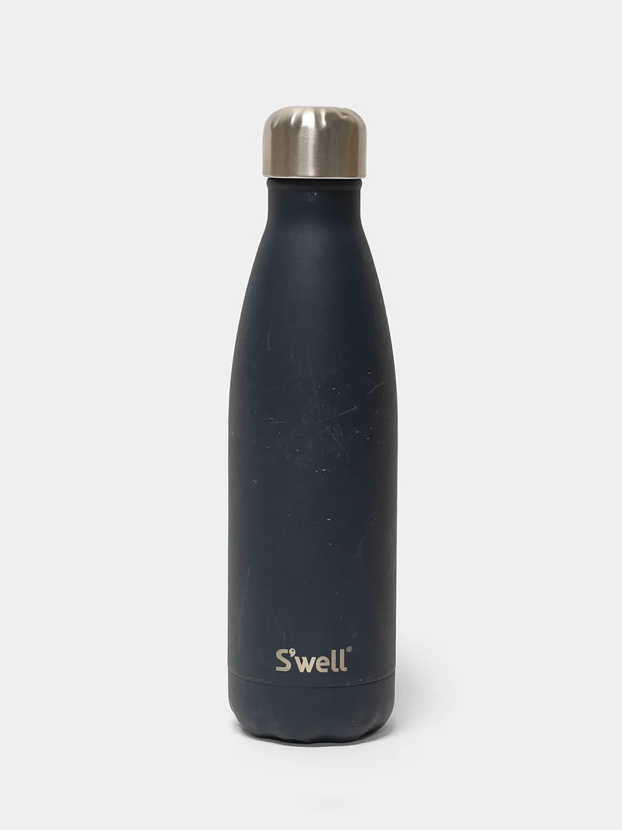 Black water bottle with a silver cap on a white background