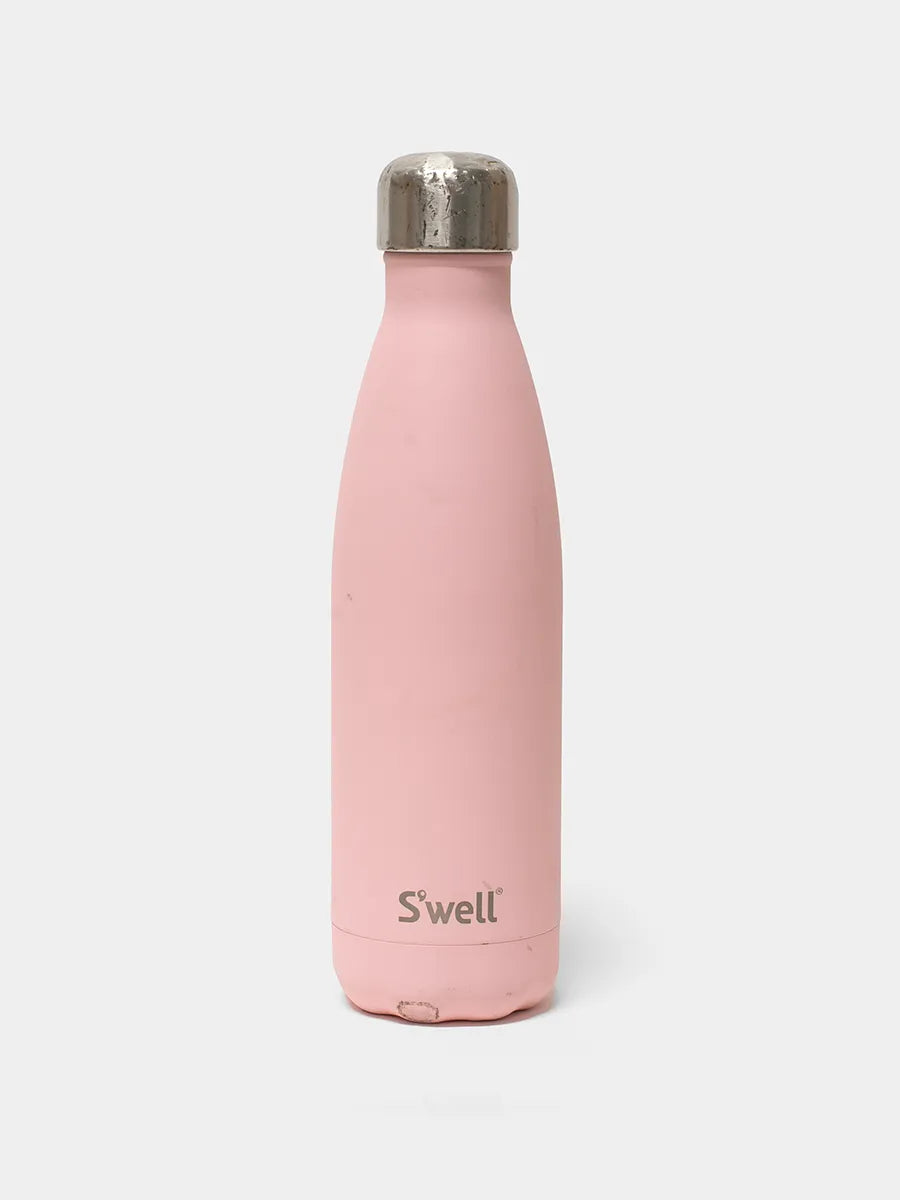 S'well Pink insulated bottle with silver cap on a white background