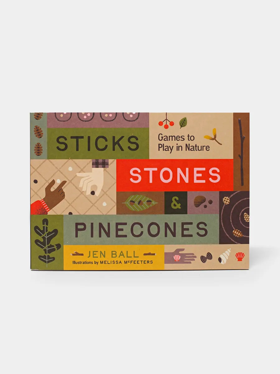 A board game box titled 'Sticks, Stones & Pinecones' with illustrations of natural elements like sticks, stones, and pinecones, and the author's name Jen Ball.