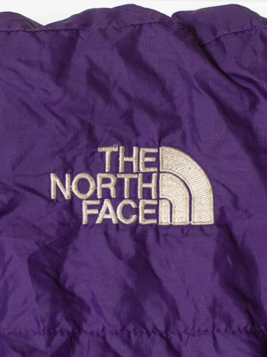 Detail of The North Face embroidered logo in White on Purple sleeping bag