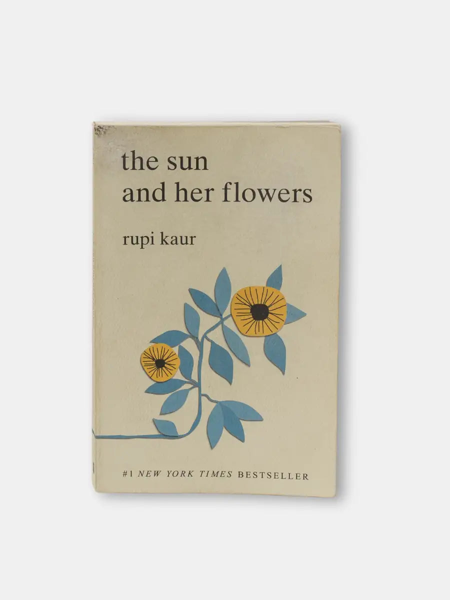 Book cover of 'the sun and her flowers' by Rupi Kaur on a white background