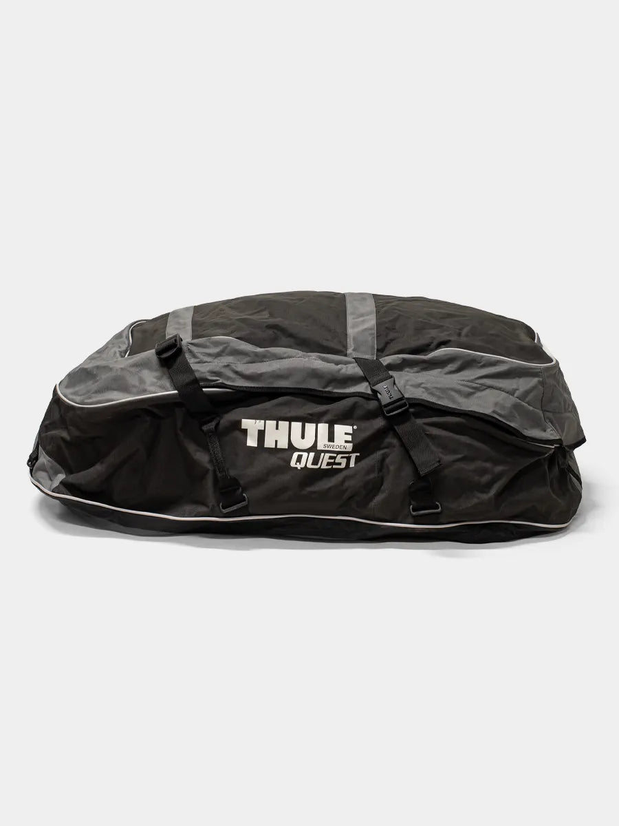 Side view of the Thule 846 Quest rooftop cargo bag, with Thule white brand logo visible.