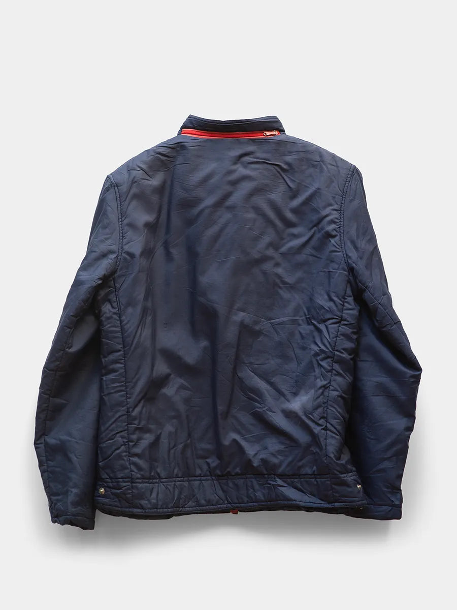 Backview of Vintage K Way Navy Jacket with Red Zipper Trim.