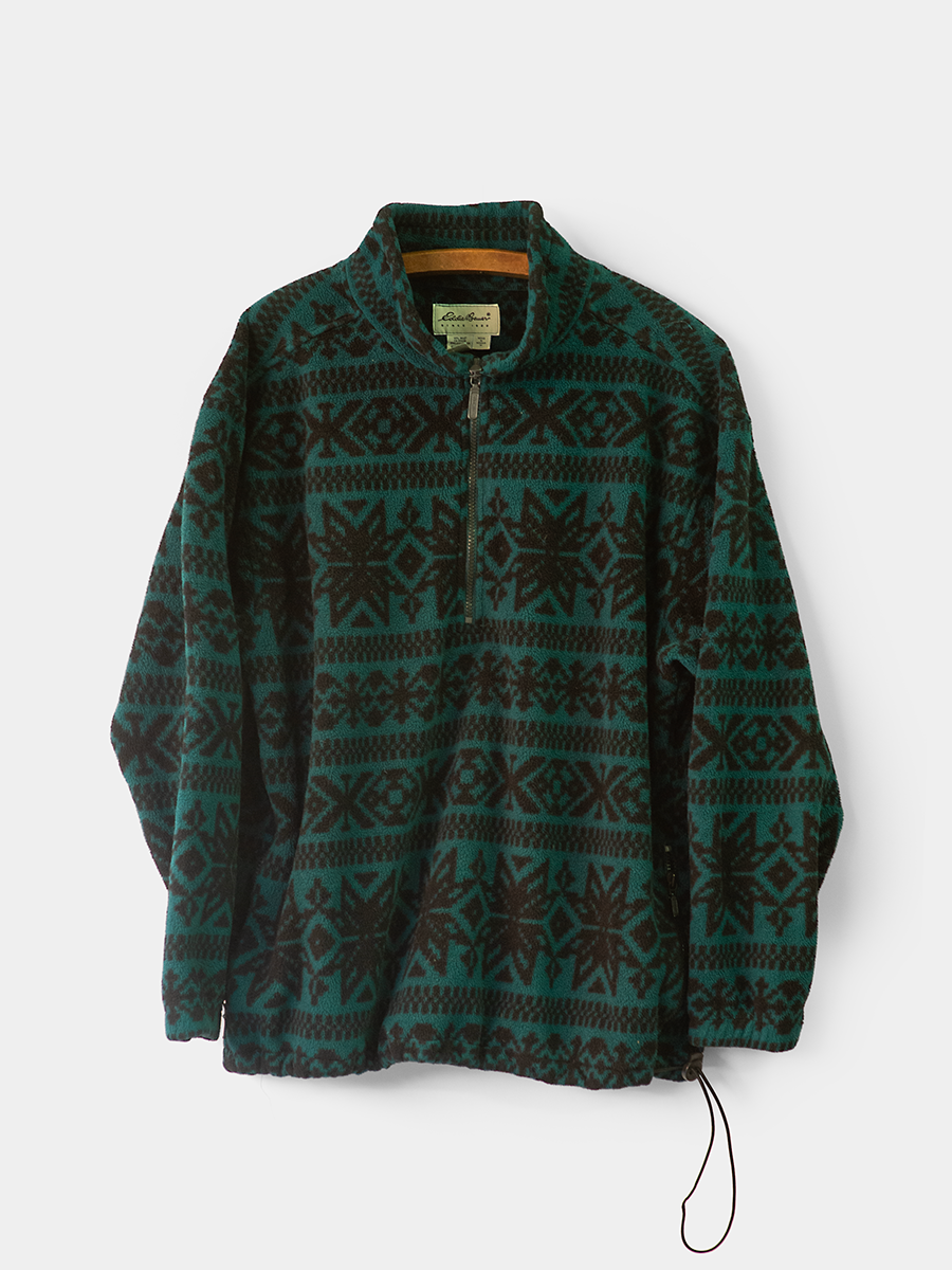 Vintage Green patterned Eddie Bauer half zip pullover on a white background