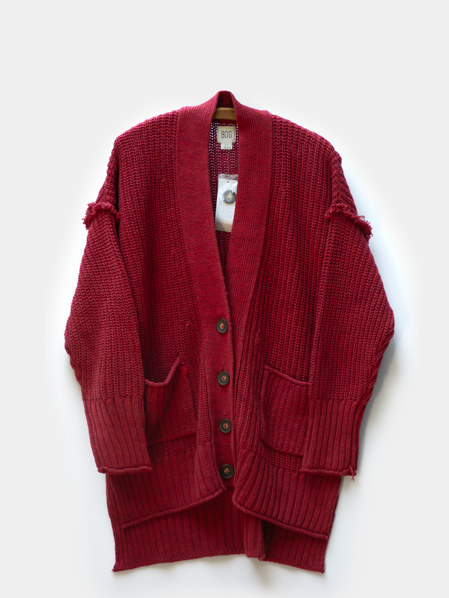 front view Red cardigan with buttons and front pockets on a white background
