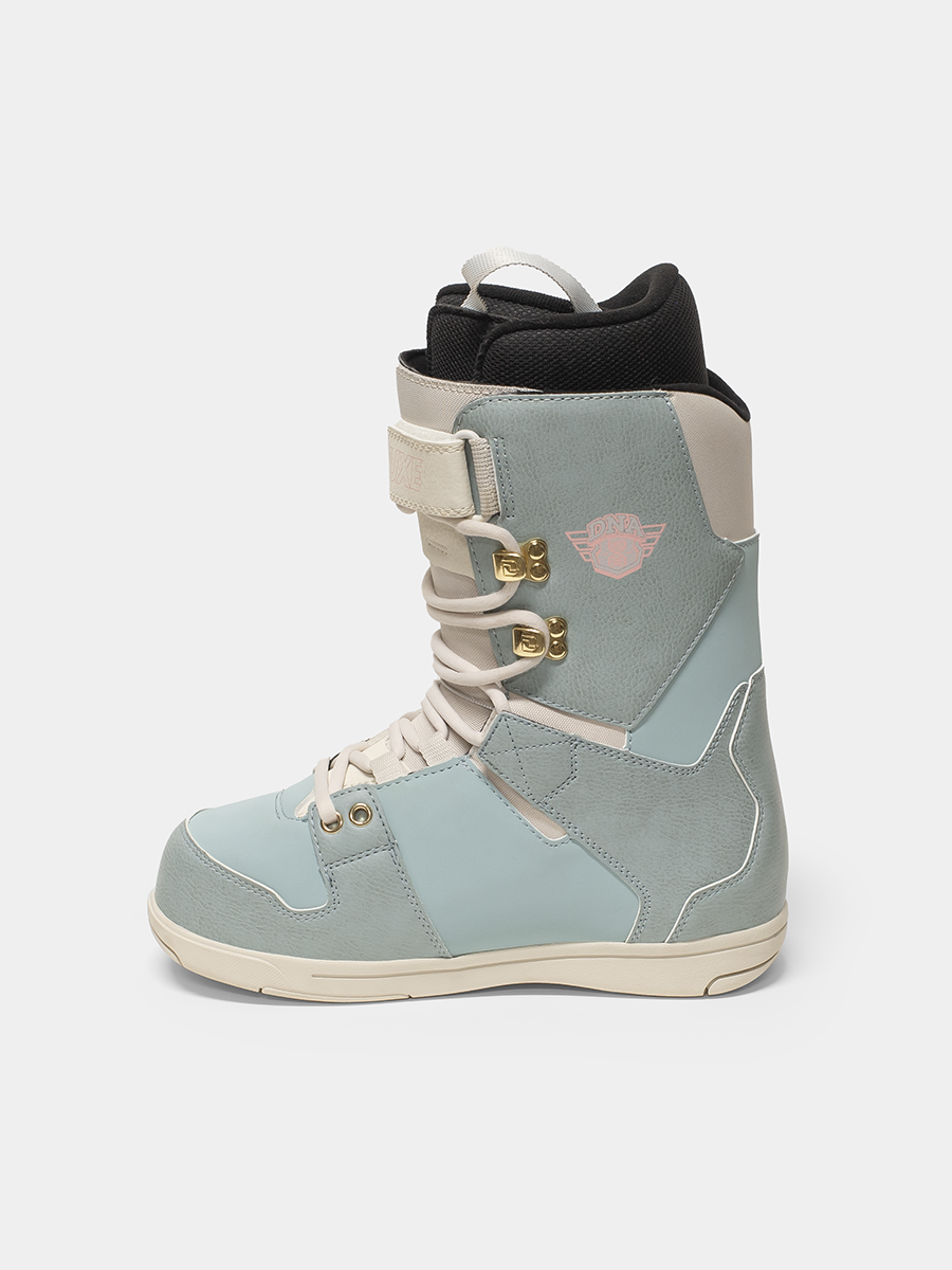 Light blue and beige snowboard boot on a white background