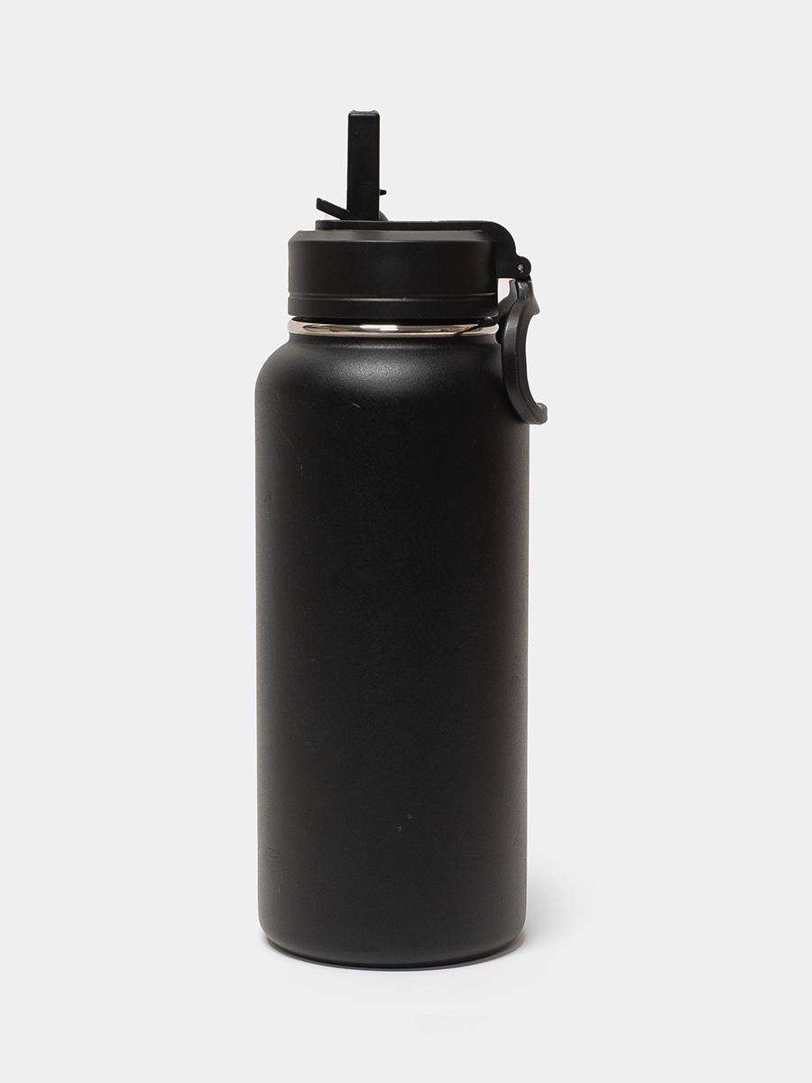 Black water bottle with a straw lid on a white background
