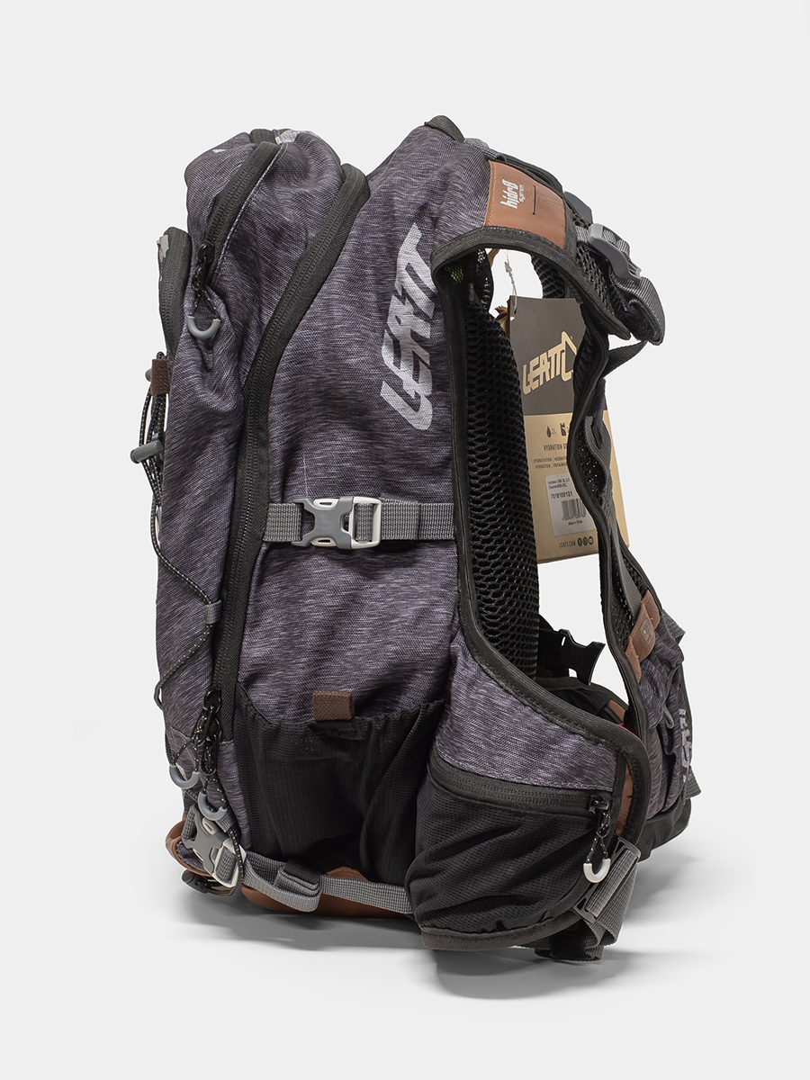 Gray hydration vest with visible branding on a white background