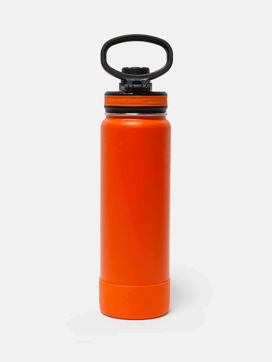 Orange ThermoFlask water bottle with black lid and handle on a white background
