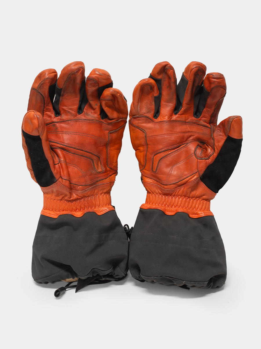 inside view black diamond orange mountaineering gloves on a white background