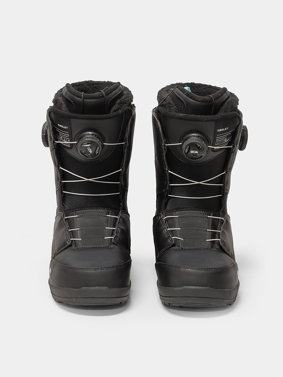 Pair of black snowboard boots on a white background